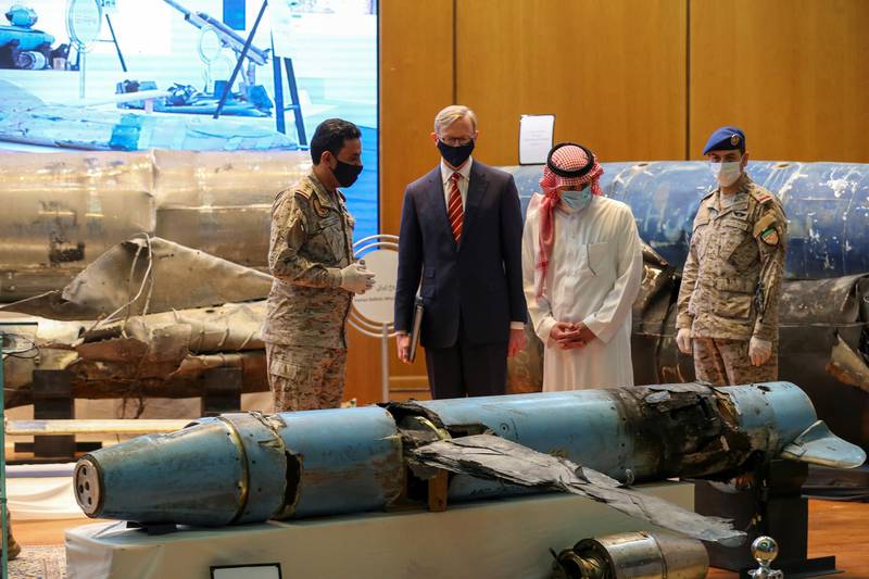 Saudi Arabia's Minister of State for Foreign Affairs Adel Al Jubeir and US Special Representative for Iran Brian Hook, check the display of the debris of ballistic missiles and weapons which were launched towards Riyadh, according to Saudi Officials, in Riyadh, Saudi Arabia June 29, 2020. Reuters