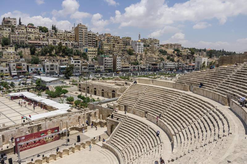 GR13T5 Amman, Jordan -May 28, 2016: Roman amphitheatre in downtown with Amman cityscape at background *** Local Caption ***  ut24no-wtgw-amman.jpg