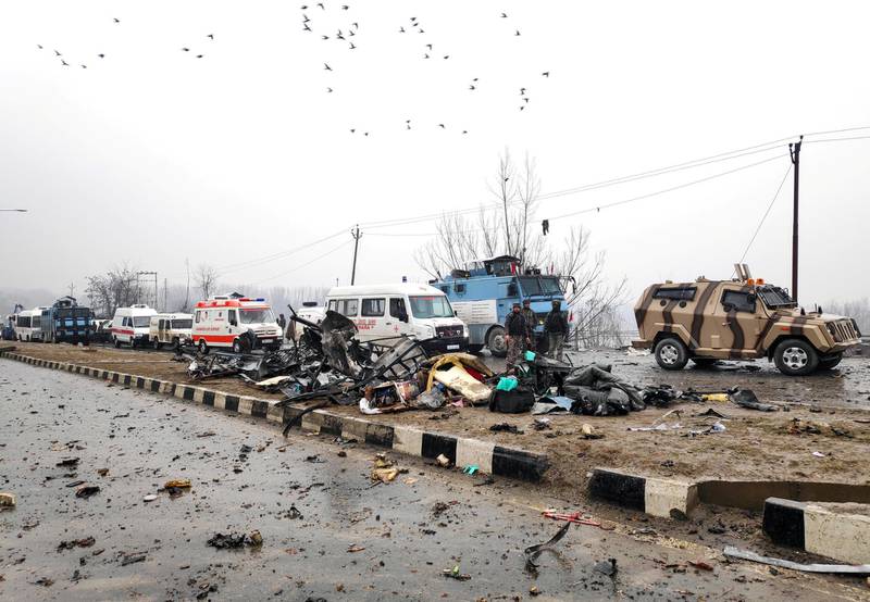 Indian soldiers examine the debris after an explosion in Lethpora in south Kashmir's Pulwama district. Reuters
