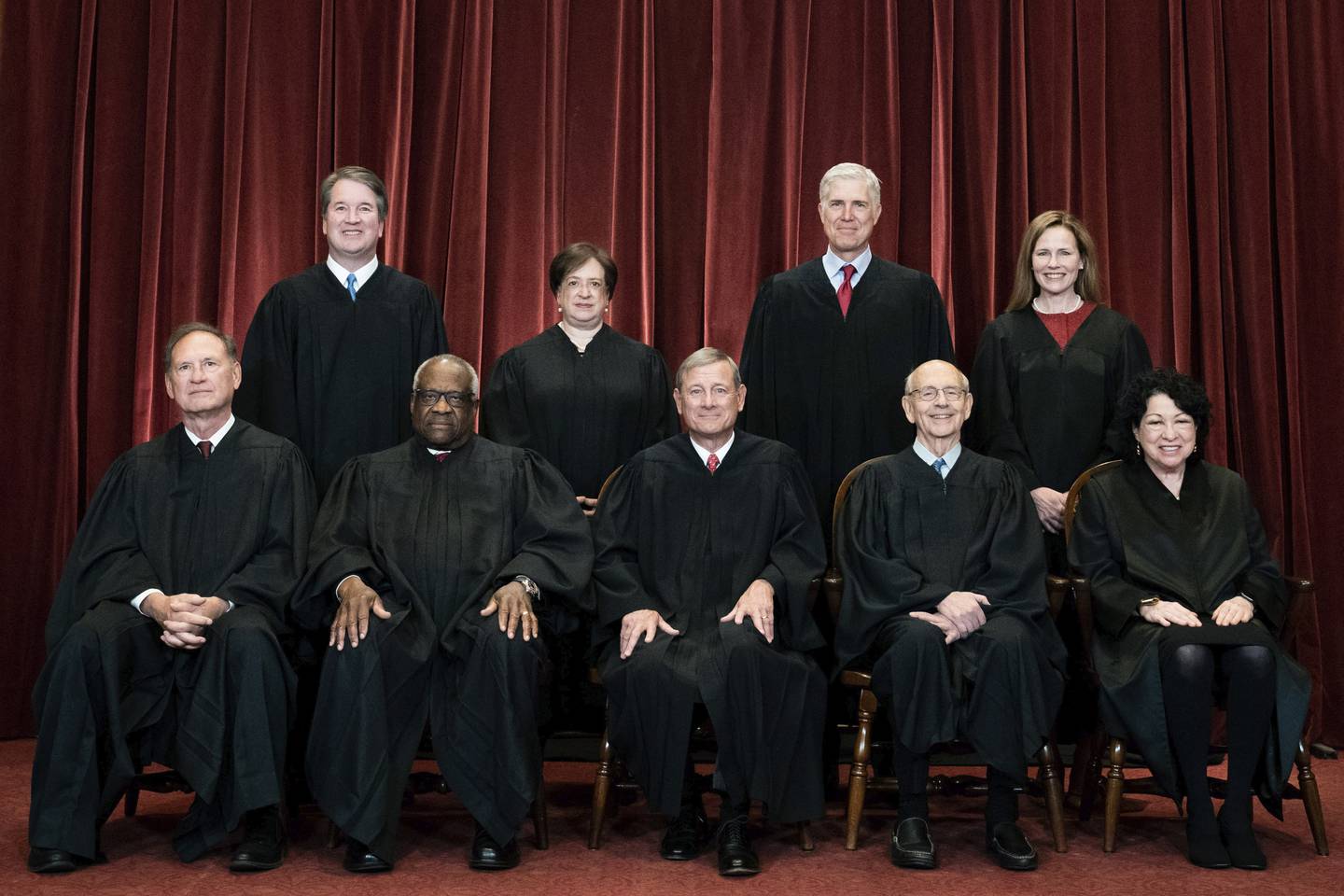Members of the US Supreme Court pose for a group photo at the Supreme Court in Washington, on April 23, 2021. AP