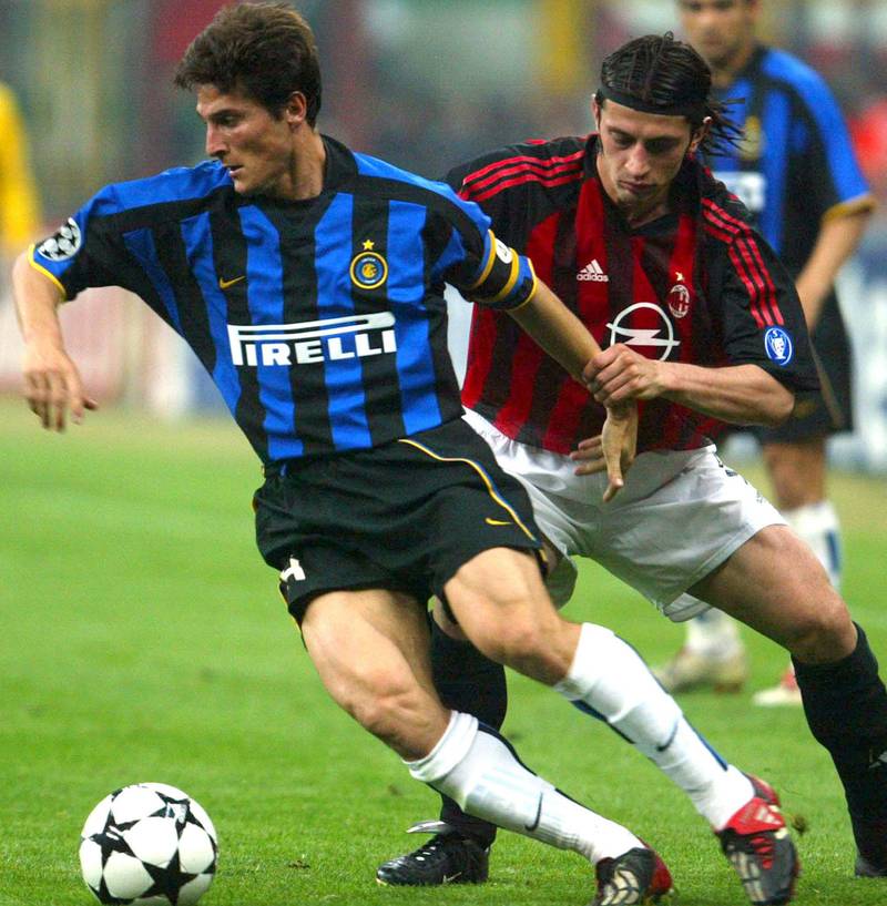 Inter Milan's Javier Zanetti under pressure from Kakha Kaladze ofAC Milan during the first leg. EPA