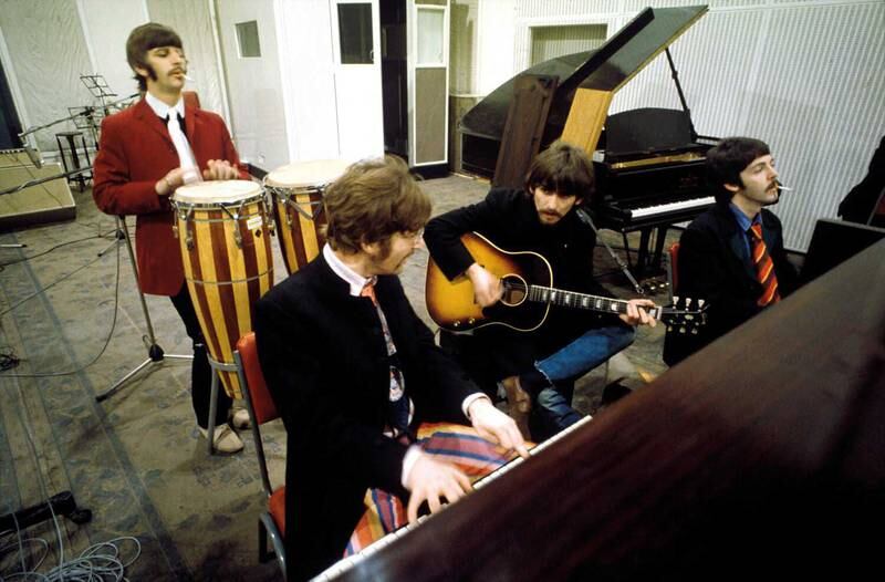 Ringo Starr, John Lennon, George Harrison and Paul McCartney working on 'Sgt Pepper’s Lonely Hearts Club Band' at Abbey Road Studios in London, 1967. Photo: Apple Corps Ltd