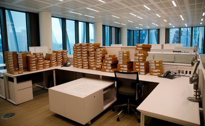 Boxes sits on desks in the consular section of the new United States Embassy building in central London. Alastair Grant / AFP