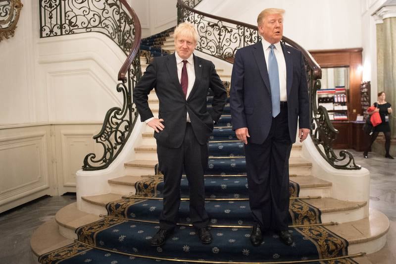 US President Donald Trump and Boris Johnson arrive for a bilateral meeting during the G7 summit in August 2019 in Biarritz, France. Getty