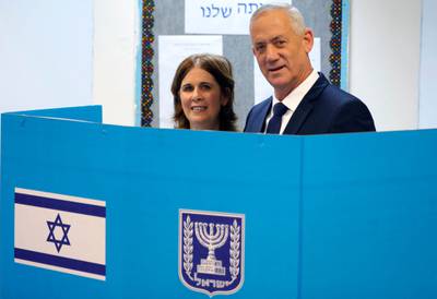 Israeli Defence Minister Benny Gantz, right, head of the new centre-right National Unity Party, and his wife Revital Gantz vote at a polling station in the city of Rosh Haayin in central Israel. AFP