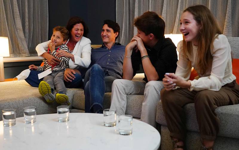 Canadian Prime Minister Justin Trudeau watches election results with wife and children. AFP