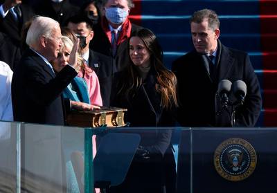 Joe Biden, flanked by First Lady Jill Biden, son Hunter and daughter Ashley, is sworn in as the 46th US President. AFP