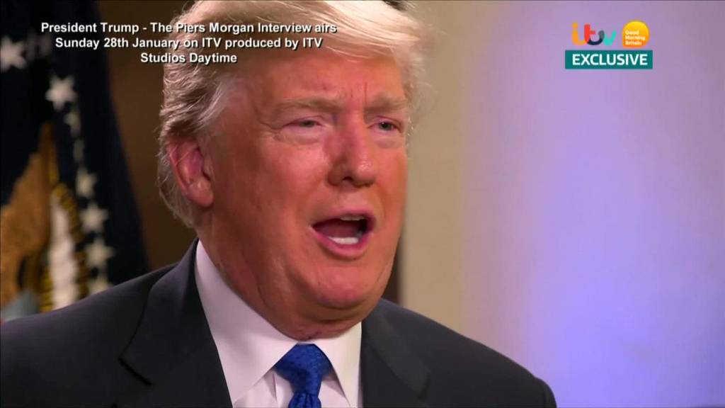 Trump offers apology over far-right video retweets