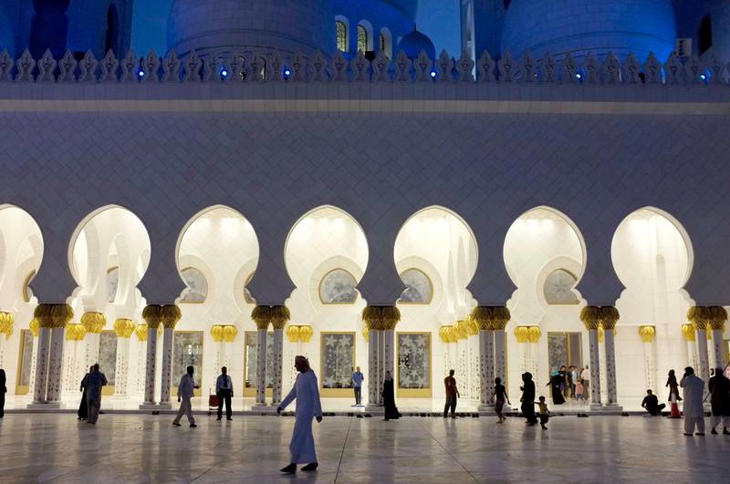 July 31.  Sheikh Zayed Mosque after sunset on the last day before the start of Ramadan for 2011. Worshipers leave after the evening prayer. July 31, Abu Dhabi. United Arab Emirates (Photo: Antonie Robertson/The National)