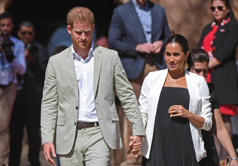 (FILES) In this file photo taken on February 25, 2019 Prince Harry and his wife Meghan, Duke & Duchess of Sussex, visit the Kasbah of the Udayas near the Moroccan capital Rabat. Talk about being born with a silver spoon in your mouth: the royal baby of Prince Harry and Meghan Markle will have a particularly glittery one. And US tax authorities will be keen to know how much that utensil is worth. That's because the baby will have dual nationality: British because of his father and US from his American mother, whose official title is the duchess of Sussex. US nationality comes with a bevy of restrictive conditions: like any American who is born, grows up and dies anywhere in the world, year after year Meghan and Harry's child will have to show the Internal Revenue Service his or her tax status is clean.
 / AFP /  FADEL SENNA
