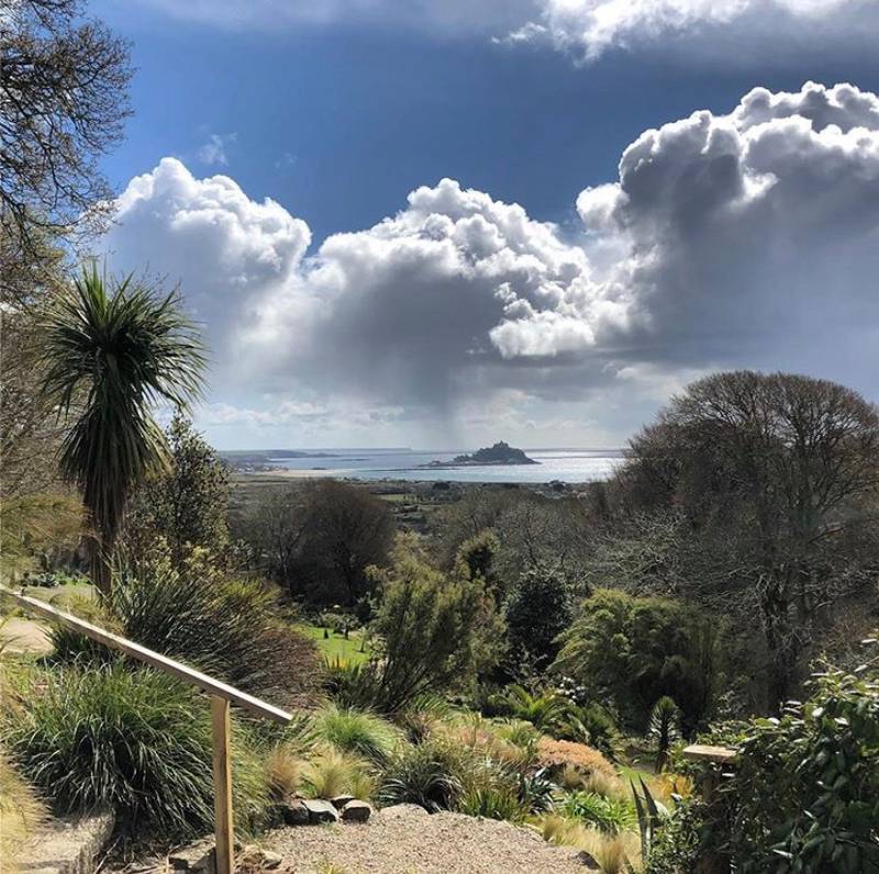 Tremenheere Sculpture Gardens with a view on to the island of St Michael's Mount, which houses a medieval castle and monastery. Photo: Tremenheere Sculpture Gardens