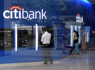 (FILES) In this file photo The Citibank Corporate Office & Headquarters is viewed in midtown Manhattan July 14, 2014.   Citigroup reported a steep decline in first-quarter profits on April 15, 2020 as it set aside around $7 billion in case of loan defaults due to coronavirus shutdown. Net profit came in at $2.5 billion for the quarter ending March 31, down 46 percent from the year-ago period. Revenues rose 12 percent to $20.7 billion. / AFP / Timothy A. CLARY
