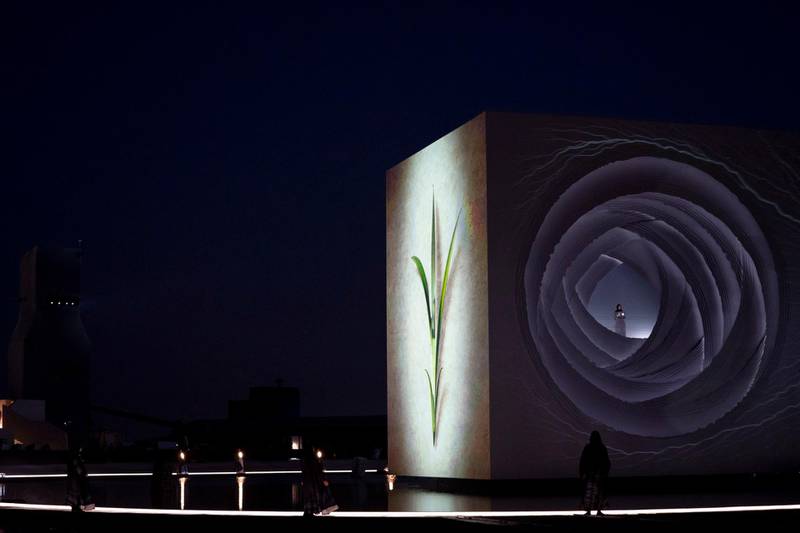 Images are projected on to a rotating cube as part of the 'Seeds of the Union' National Day show held in Jubail Mangrove Park in Abu Dhabi. Courtesy: Sheikh Mohamed bin Zayed Twitter