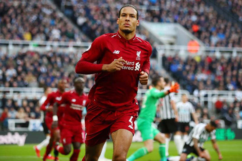 NEWCASTLE UPON TYNE, ENGLAND - MAY 04: Virgil van Dijk of Liverpool celebrates after scoring his team's first goal during the Premier League match between Newcastle United and Liverpool FC at St. James Park on May 04, 2019 in Newcastle upon Tyne, United Kingdom. (Photo by Clive Brunskill/Getty Images)