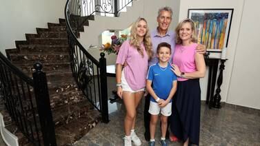 Julie Grobler with her husband, Hugo, and their children, Jenna, 15, and Grayson, 10, in their rented four-bedroom villa in Al Barsha South, Dubai. Chris Whiteoak / The National