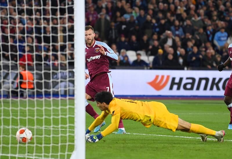 Andriy Yarmolenko of West Ham United scores past Yassine Bounou of Sevilla. Getty Images