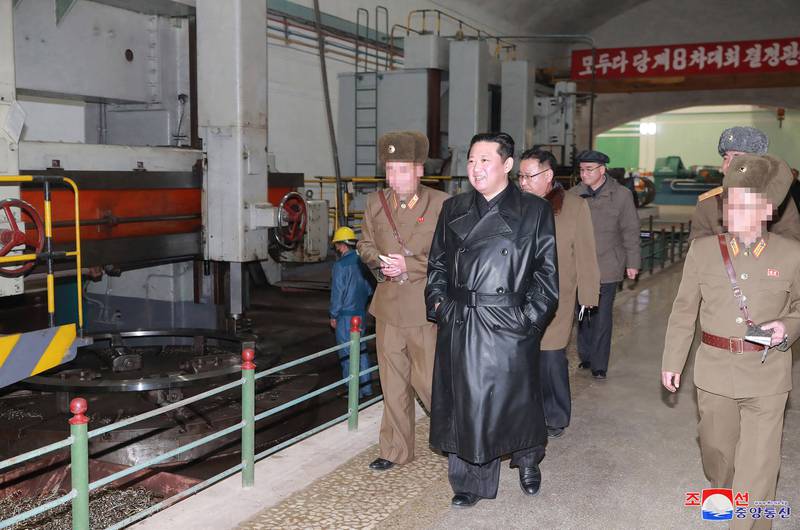 North Korean leader Kim Jong-un inspects a munitions factory producing a major weapon system in an undated picture.  AFP