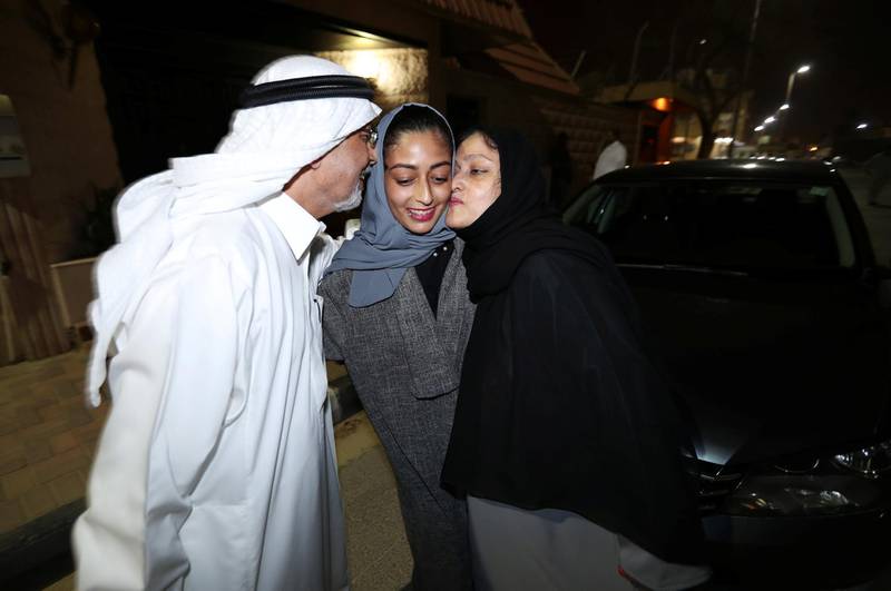 Hannan Iskandar is kissed by her parents, after she drove her car in her neighbourhood, in Al Khobar, Saudi Arabia. Hamad I Mohammed / Reuters