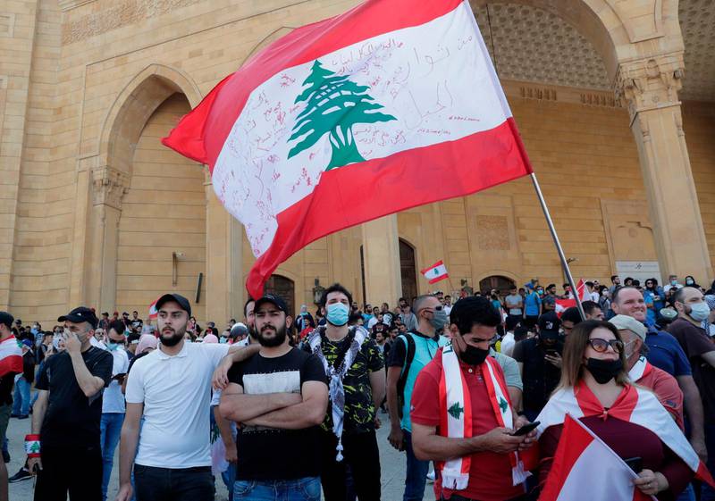 Protesters gather in front of Mohammad Al Amin mosque during a demonstration in central Beirut.  AFP