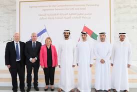 Abdulla bin Touq, UAE Minister of Economy, centre, and Dr Thani Al Zeyoudi, UAE Minister of State for Foreign Trade, third from right, with Orna Barbivai, Israel's former Economy Minister, third from left, and the negotiating teams from each country. Photo: Ministry of Economy