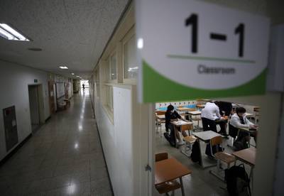 High school students prepare for a class at a high school in Seoul, South Korea. Reuters