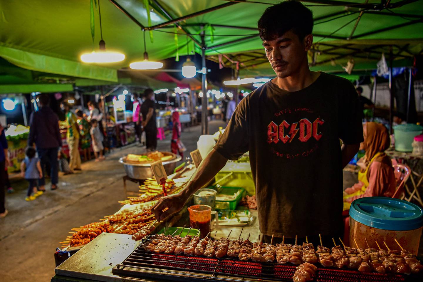 Street food stalls at night market in Narathiwat province, Southern Thailand.  AFPMore