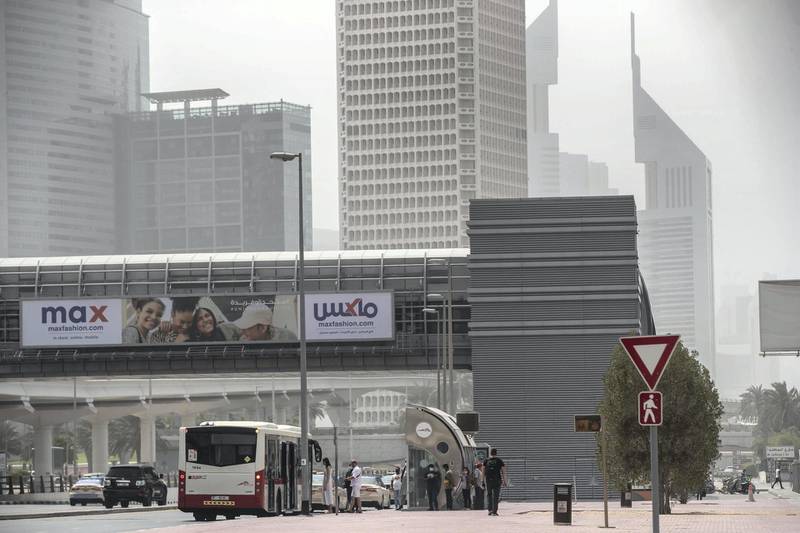 DUBAI, UNITED ARAB EMIRATES. 12 MARCH 2021. Dusty weather with wind in Dubai limits visability. (Photo: Antonie Robertson/The National) Journalist: None. Section: National.