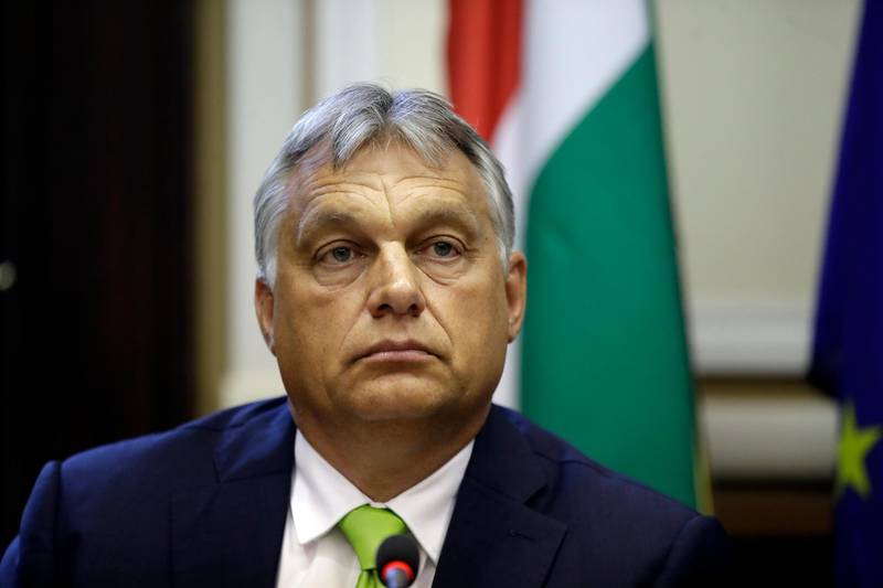 Hungary's Prime Minister Viktor Orban attends a news conference after meeting Italy's Interior Minister and Deputy-Premier Matteo Salvini , in Milan, Italy, Tuesday, Aug. 28, 2018. (AP Photo/Luca Bruno)