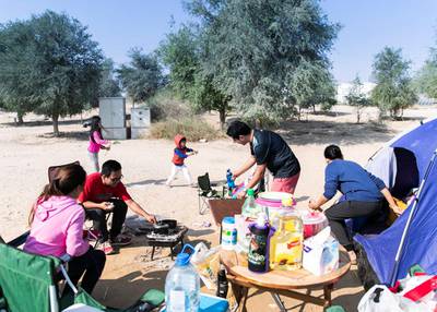 DUBAI, UNITED ARAB EMIRATES. 2 DECEMBER 2019. Sanchez and Calimag family spend UAE’s National Day holiday on Al Qudra lake.(Photo: Reem Mohammed/The National)Reporter:Section: