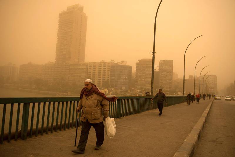 A man walks during a sandstorm in Cairo, Egypt, on January 16, 2019. EPA