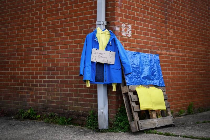 A sign advertising the Ukrainian Refugee Boutique outside the White Eagle donation centre as the charity prepares to transport a shipment of Shelterbags to Ukraine. Getty Images