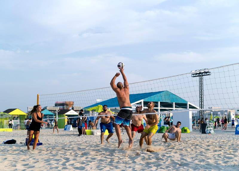 DUBAI, UNITED ARAB EMIRATES. 18 OCTOBER 2019. Volleyball at Kite Beach Fitness Village.The city launches the third edition of the Dubai Fitness Challenge (DFC) today with wide range of activities across the city that will be accessible to the entire Dubai community.   Here, Kites Beach is converted into a dedicated fitness village with different zones for free outdoor activities.(Photo: Reem Mohammed/The National)Reporter:Section: