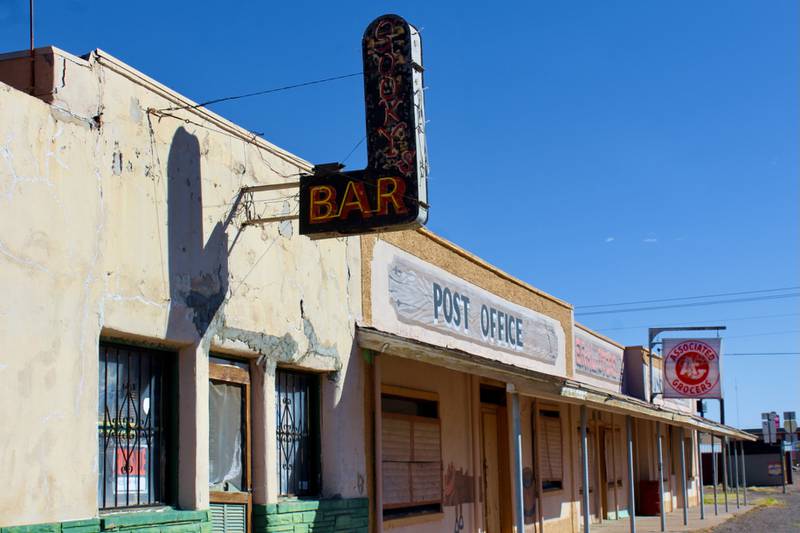 Many of Van Horn's closed-up shops and businesses give it a ghost town feel. Holly Aguirre / The National