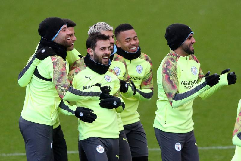 Left to right:  Bernardo Silva, Riyad Mahrez, Gabriel Jesus and Sergio Aguero of Manchester City share a joke during training. Getty