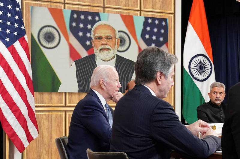 US President Joe Biden, seated with US Secretary of State Antony Blinken and Indian External Affairs Minister Subrahmanyam Jaishankar, holds a videoconference with Indian Prime Minister Narendra Modi from Washington April 2022. Reuters