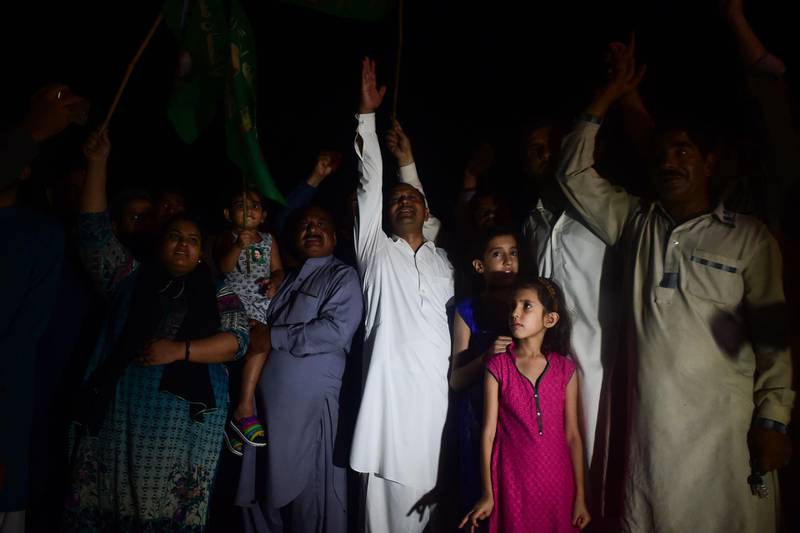 Activists of Pakistan Muslim League Nawaz (PML-N) party chant slogans outside the Adiala Prison in Rawalpindi on July 13, 2018, after he was shifted there. AFP