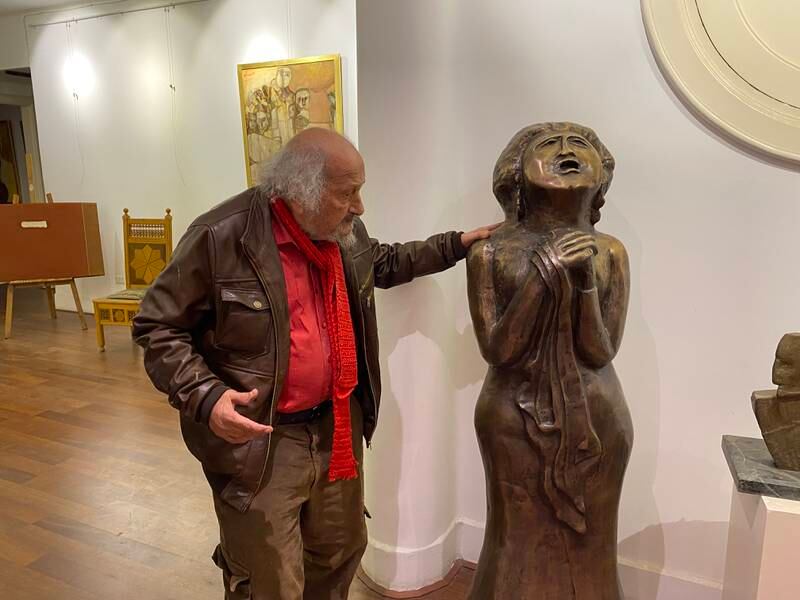 Bahgory with his sculpture of Umm Kulthum at the George Bahgory Museum in downtown Cairo. Nada El Sawy / The National