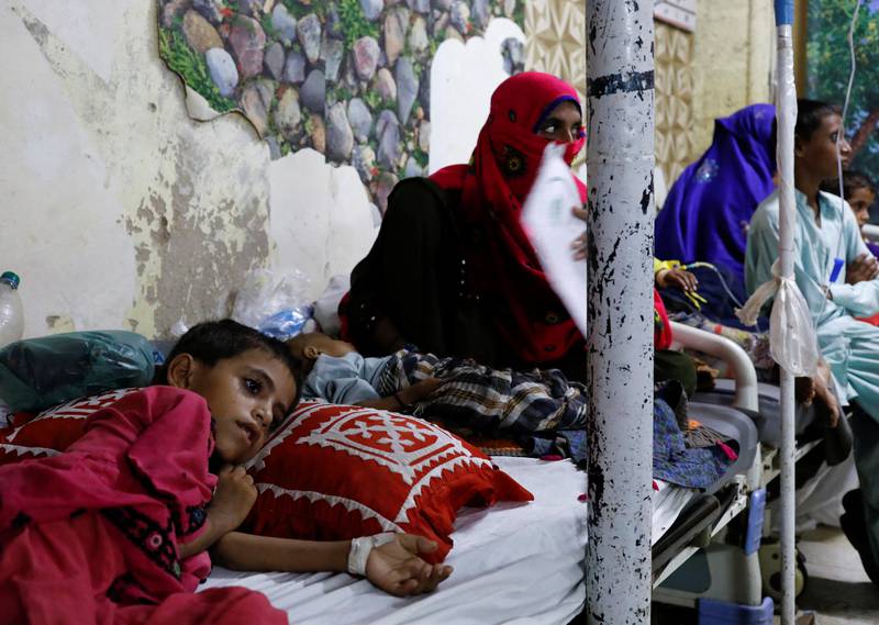 Flood-affected children suffering from malaria receive treatment at the Sayed Abdullah Shah Institute of Medical Sciences in Sehwan. Reuters