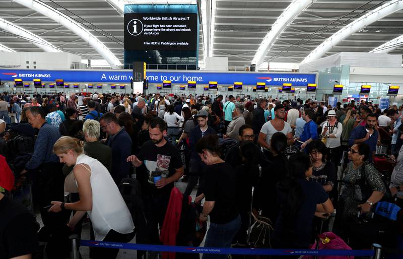 British Airways check-in desks at Heathrow Terminal 5, where an IT failure delayed and cancelled hundreds of flights over the weekend. Neil Hall / Reuters