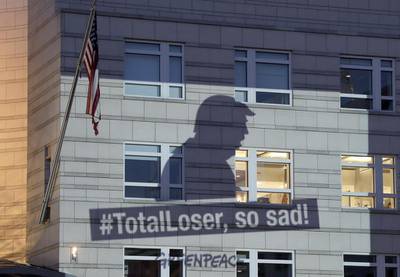 A Greenpeace banner showing US president Donald Trump and the slogan ‘#TotalLoser, so sad!’ is projected onto the facade of the US Embassy in Berlin, Germany. Trump declared on Thursday he was pulling the US from the landmark Paris climate agreement, striking a major blow to worldwide efforts to combat global warming and distancing the country from its closest allies abroad. Michael Sohn / AP Photo