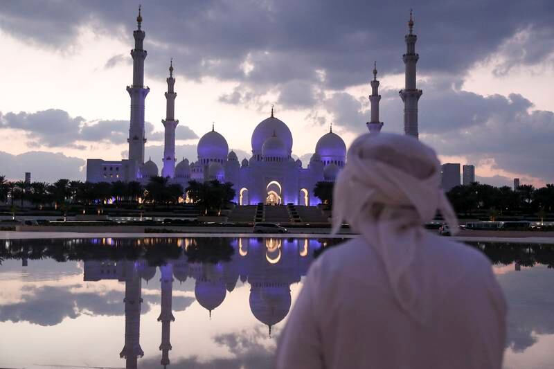 Sheikh Zayed Grand Mosque in Abu Dhabi. Many Covid-19 rules have been eased this Ramadan but some, such as mandatory mask-wearing inside, remain. Khushnum Bhandari / The National