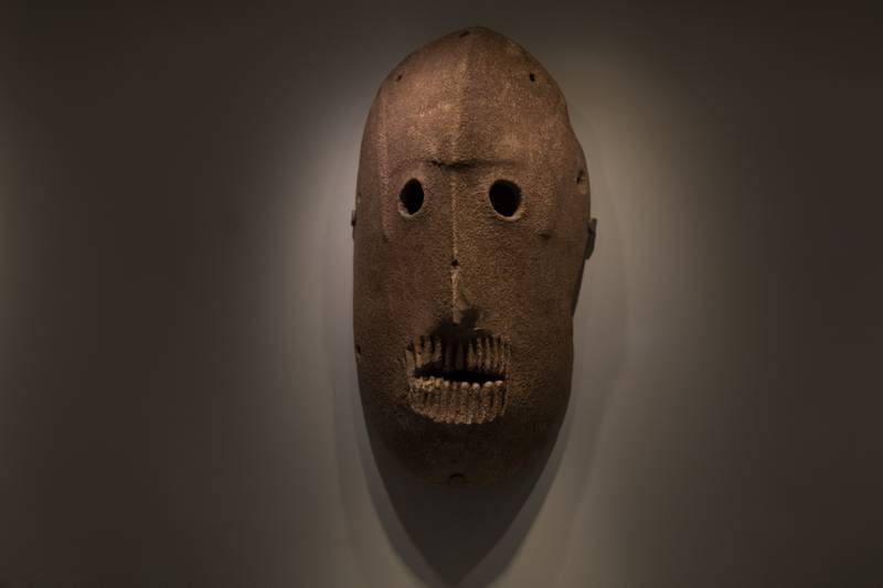 A Neolithic mask from American billionaire Michael Steinhardt's collection is displayed at the Israel Museum in Jerusalem. AP