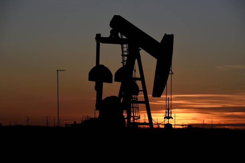 FILE PHOTO: A pump jack operates at sunset in an oil field in Midland, Texas U.S. August 22, 2018. Picture taken August 22, 2018. REUTERS/Nick Oxford/File Photo