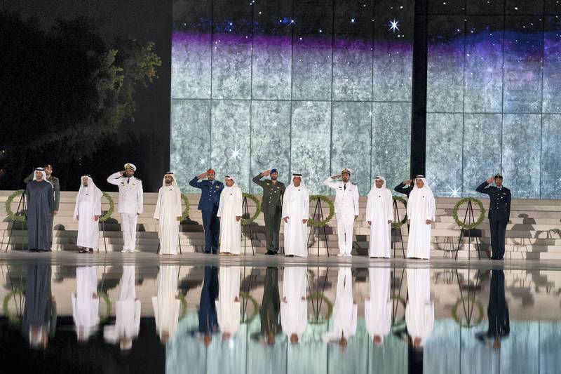 ABU DHABI, UNITED ARAB EMIRATES - November 30, 2019: (front L-R) HH Sheikh Mohamed bin Zayed Al Nahyan, Crown Prince of Abu Dhabi and Deputy Supreme Commander of the UAE Armed Forces, HH Dr Sheikh Sultan bin Mohamed Al Qasimi, UAE Supreme Council Member and Ruler of Sharjah, HH Sheikh Mohamed bin Rashid Al Maktoum, Vice-President, Prime Minister of the UAE, Ruler of Dubai and Minister of Defence, HH Sheikh Humaid bin Rashid Al Nuaimi, UAE Supreme Council Member and Ruler of Ajman, HH Sheikh Saud bin Saqr Al Qasimi, UAE Supreme Council Member and Ruler of Ras Al Khaimah, HH Sheikh Hamad bin Mohamed Al Sharqi, UAE Supreme Council Member and Ruler of Fujairah and HH Sheikh Saud bin Rashid Al Mu'alla, UAE Supreme Council Member and Ruler of Umm Al Quwain, stand for a group photograph during a Commemoration Day ceremony at Wahat Al Karama, a memorial dedicated to the memory of UAE’s National Heroes in honour of their sacrifice and in recognition of their heroism.

( Hamad Al Mansoori for Ministry of Presidential Affairs )
---