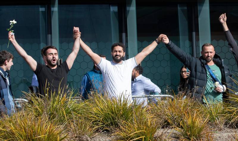 Mosque shooting survivors from left, Mustafa Boztas, Wassail Daragmih and Temel Atacocugu leave the Christchurch High Court after the sentencing hearing for Australian Brenton Harrison Tarrant, in Christchurch, New Zealand. AP Photo