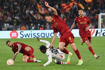 Roma's Serbian midfielder Nemanja Matic fights for the ball with Bayer Leverkusen's Dutch defender Jeremie Frimpong. AFP
