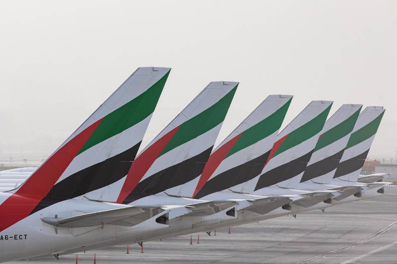 Emirates Boeing Co. 777-300 aircraft are seen in a parking zone at Dubai International Airport.