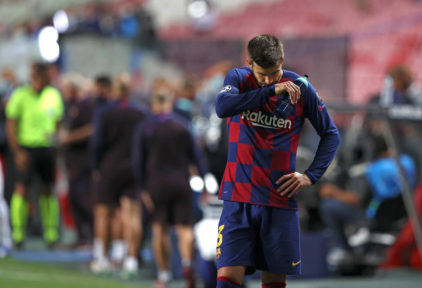 Barcelona's Gerard Pique reacts after the the Champions League quarterfinal soccer match between Barcelona and Bayern Munich in Lisbon, Portugal, Friday, Aug. 14, 2020. Bayern won the match 8-2. (Rafael Marchante/Pool via AP)