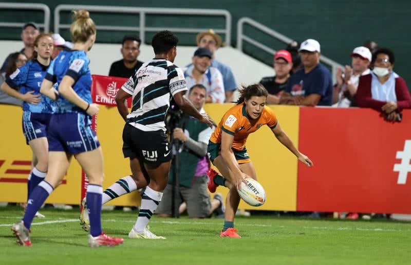 Australia's Madison Ashby scores a try against Fiji.