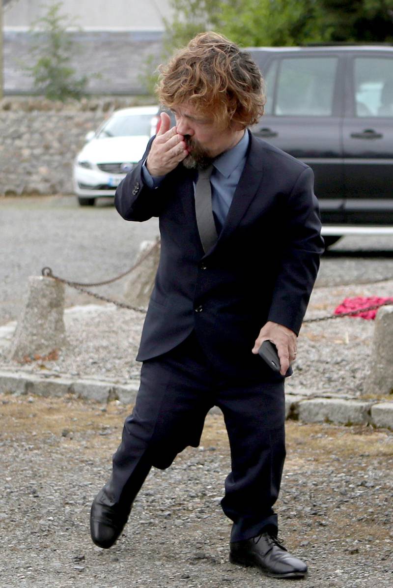 Actor Peter Dinklage arrives at Rayne Church, Kirkton of Rayne for the wedding ceremony of his Game Of Thrones co-stars Kit Harington and Rose Leslie.  Jane Barlow / PA via AP
